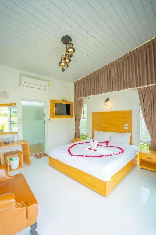 Bed in The White House Boutique Resort