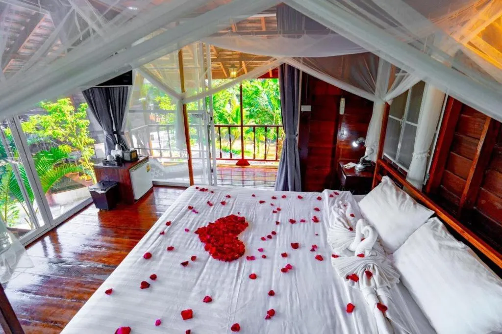 Bed in The White House Boutique Resort