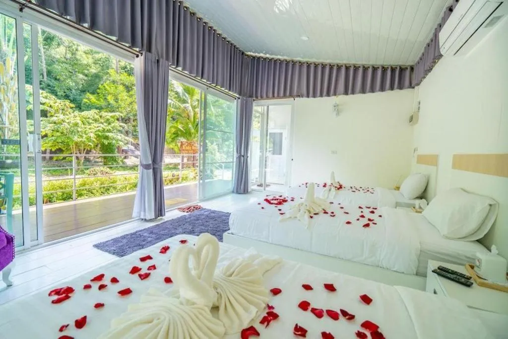 Bed in The White House Boutique Resort