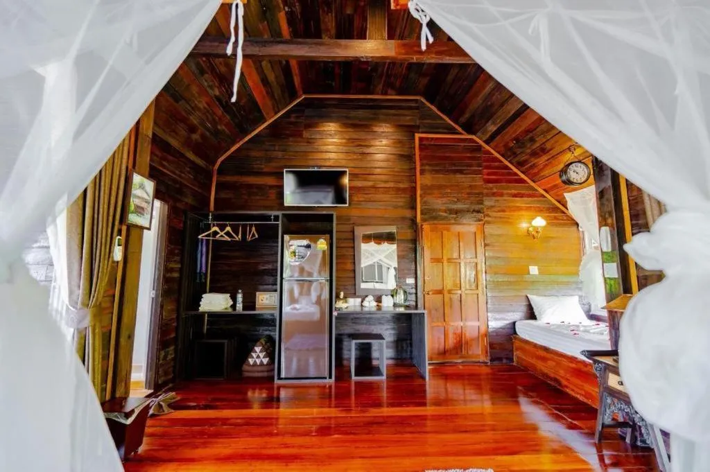 Bed in The White House Boutique Resort