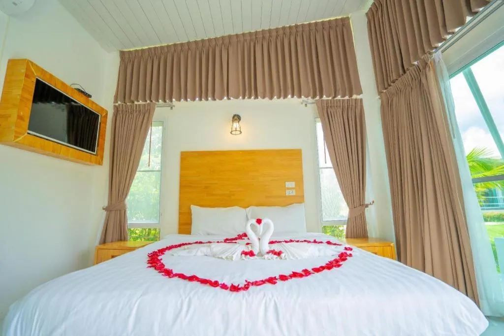 Bed in The White House Boutique Resort