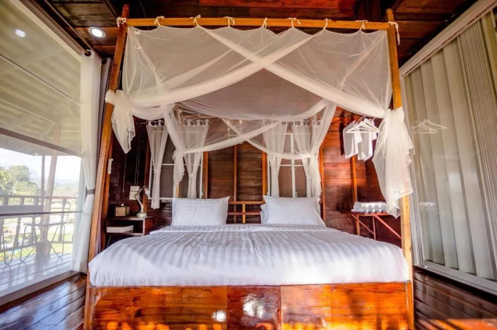 Bed in The White House Boutique Resort