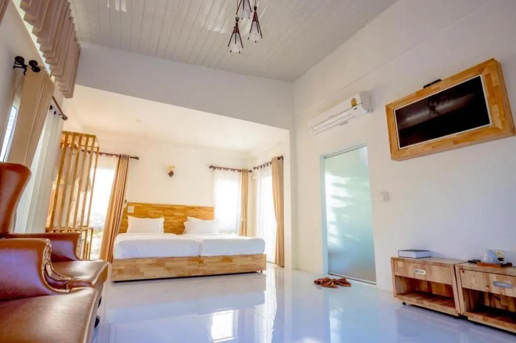 Bed in The White House Boutique Resort