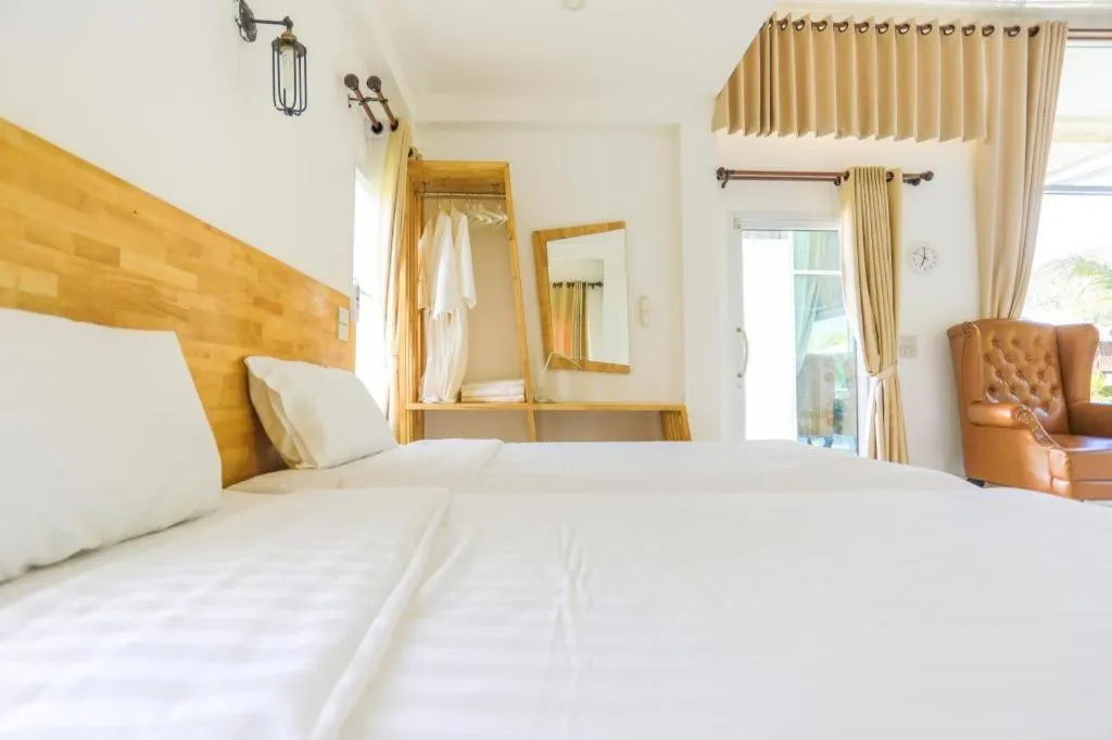 Bed in The White House Boutique Resort