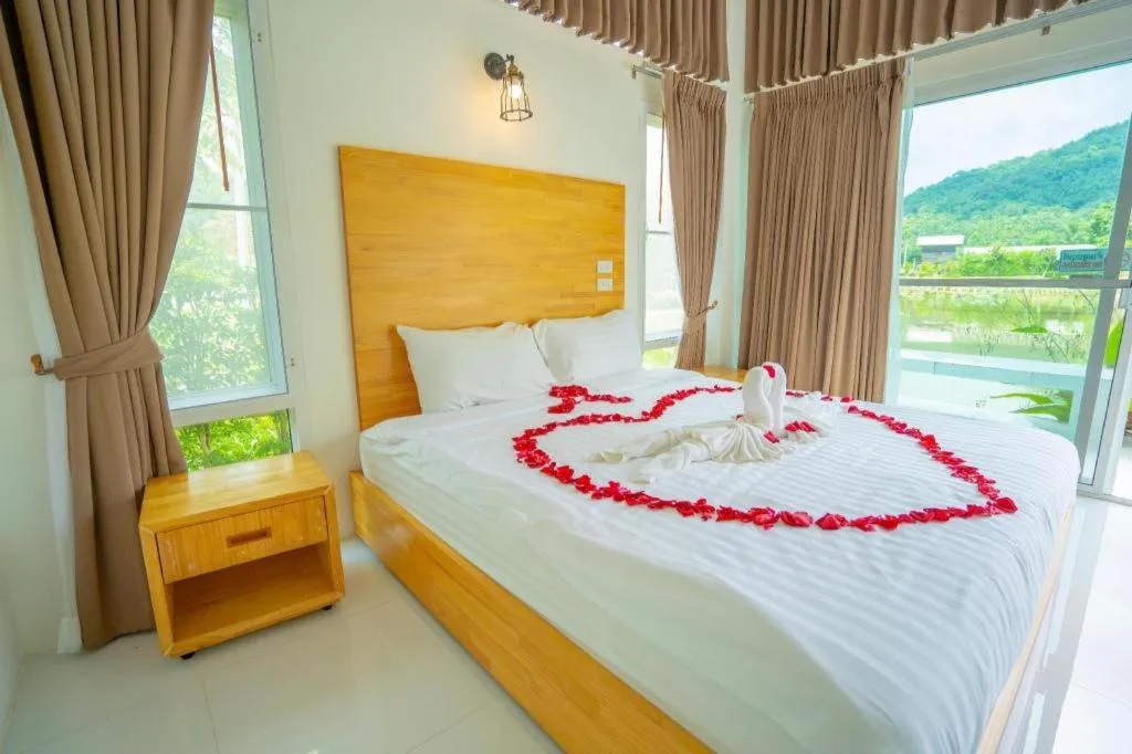 Bed in The White House Boutique Resort