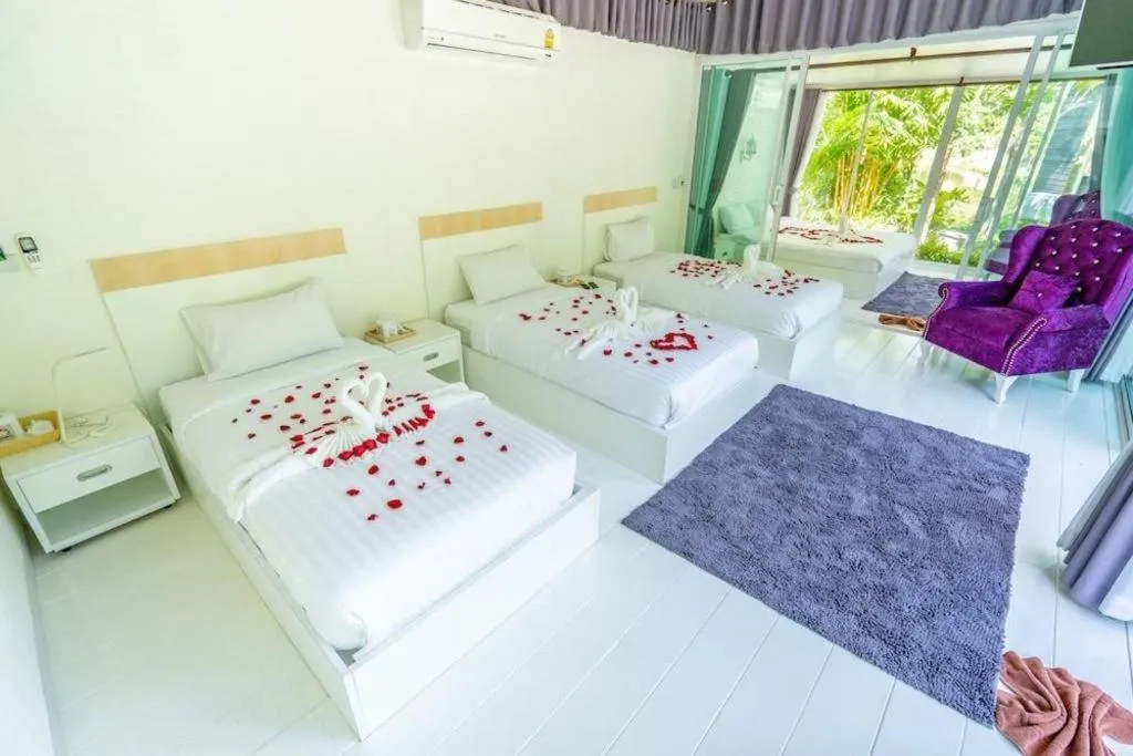 Bed in The White House Boutique Resort