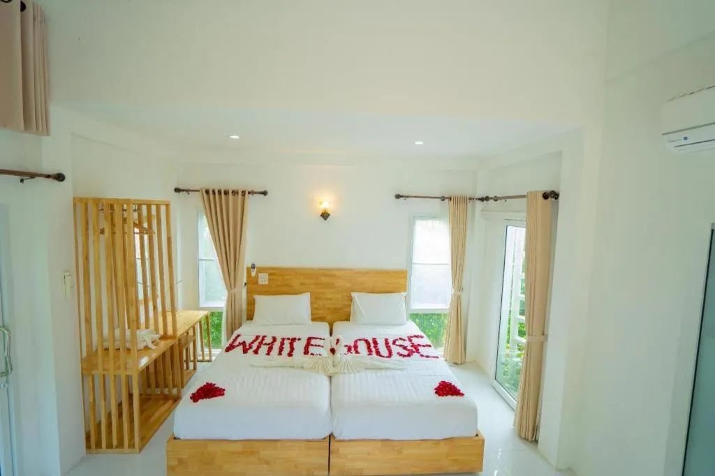 Bed in The White House Boutique Resort