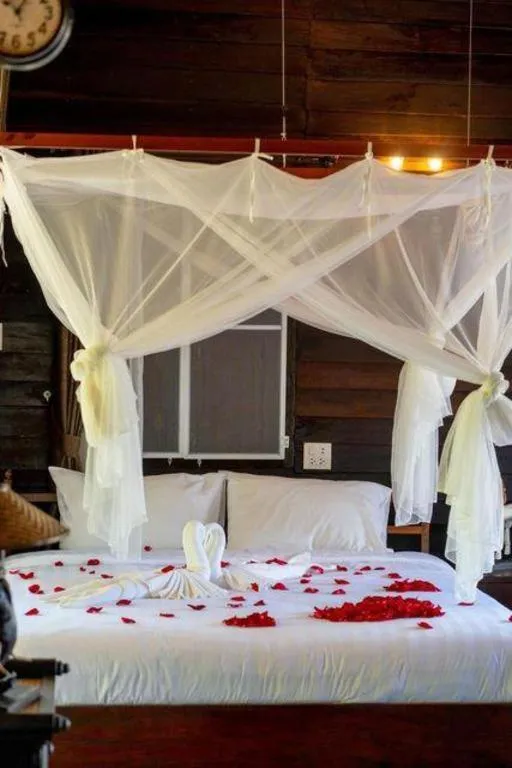 Bed in The White House Boutique Resort