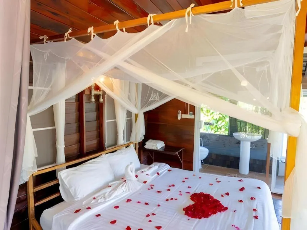 Bed in The White House Boutique Resort