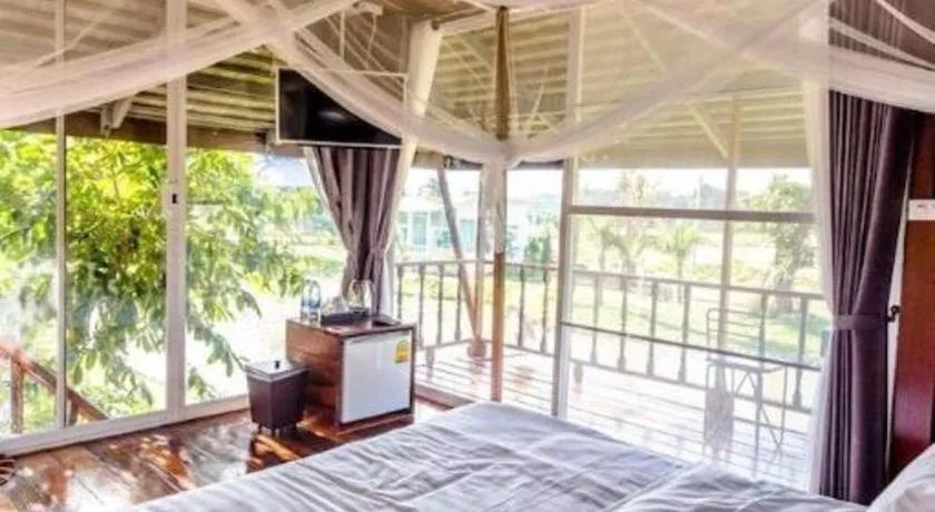 Bed in The White House Boutique Resort