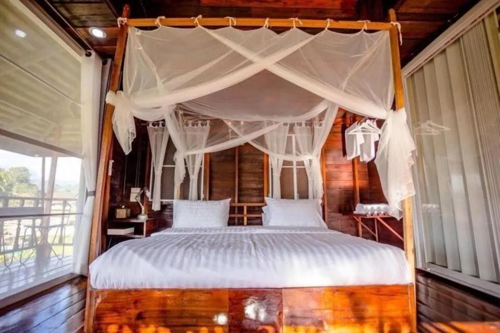 Bed in The White House Boutique Resort