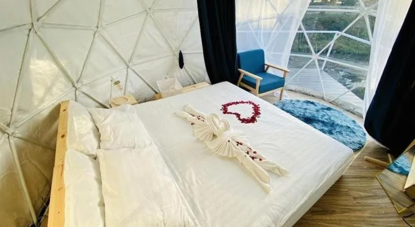 Bed in The White House Boutique Resort