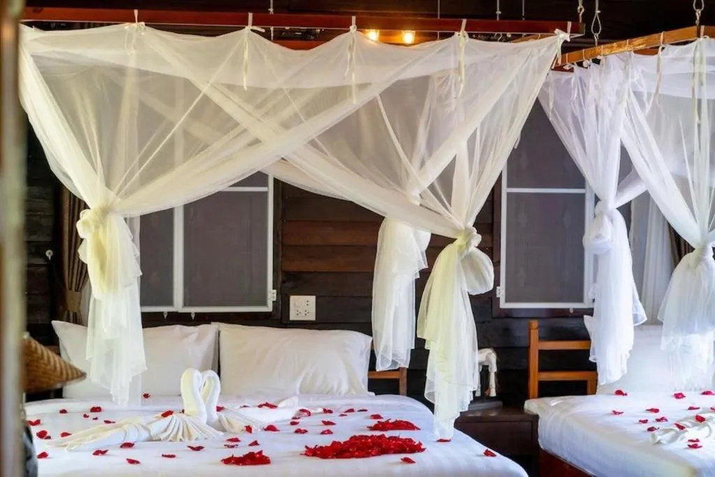 Bed in The White House Boutique Resort