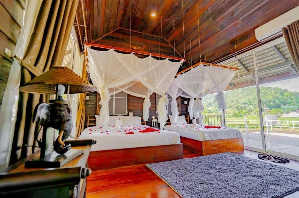 Bed in The White House Boutique Resort