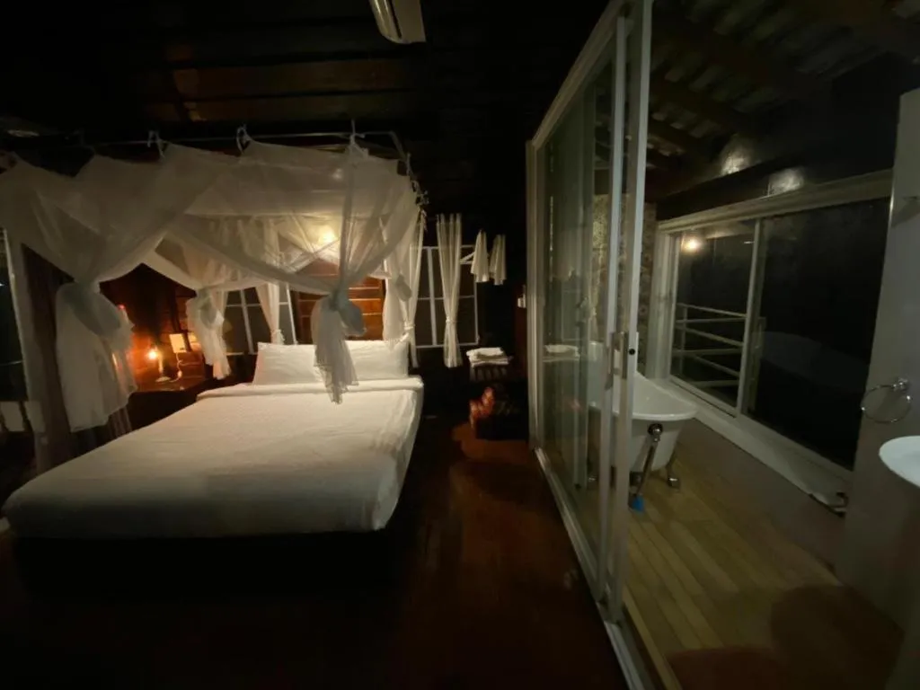 Bed in The White House Boutique Resort