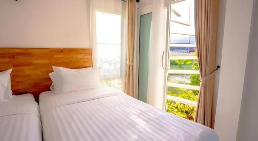 Bed in The White House Boutique Resort