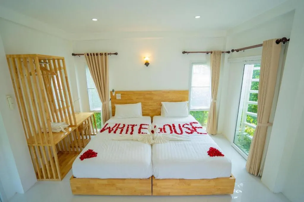 Bed in The White House Boutique Resort