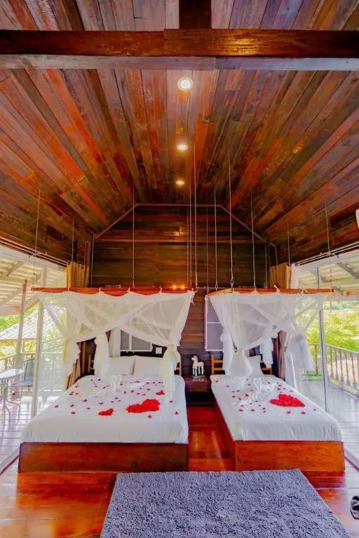 Bed in The White House Boutique Resort