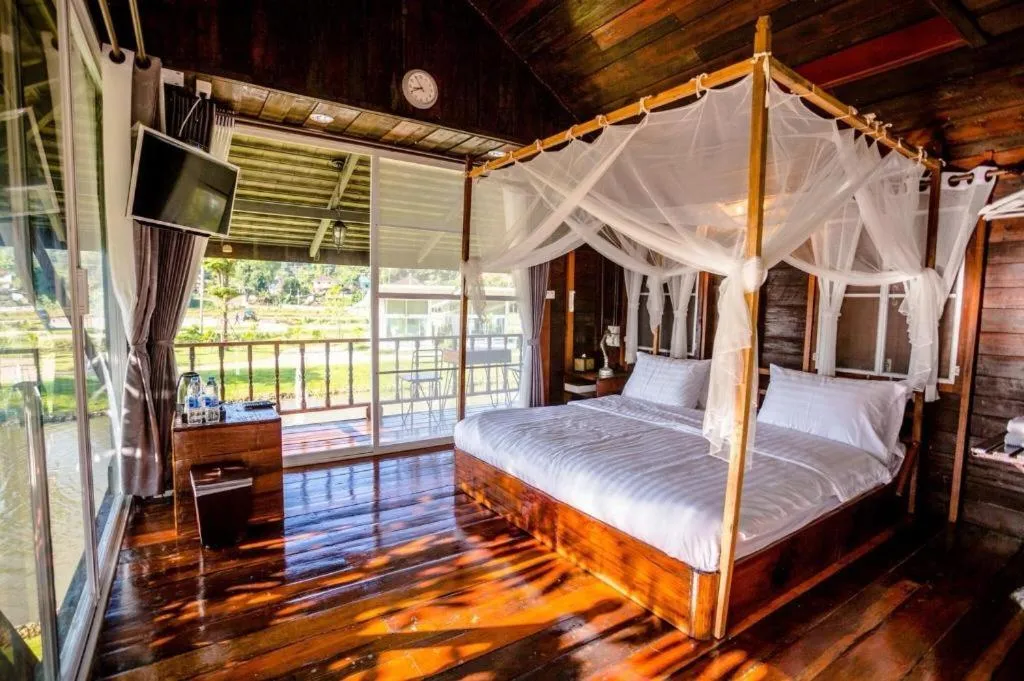 Bed in The White House Boutique Resort