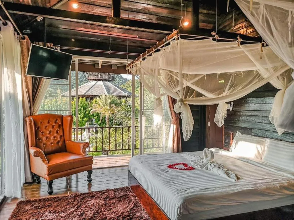 Bed in The White House Boutique Resort