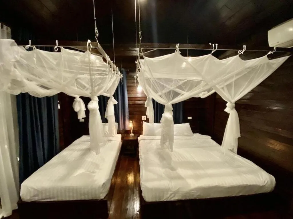 Bed in The White House Boutique Resort