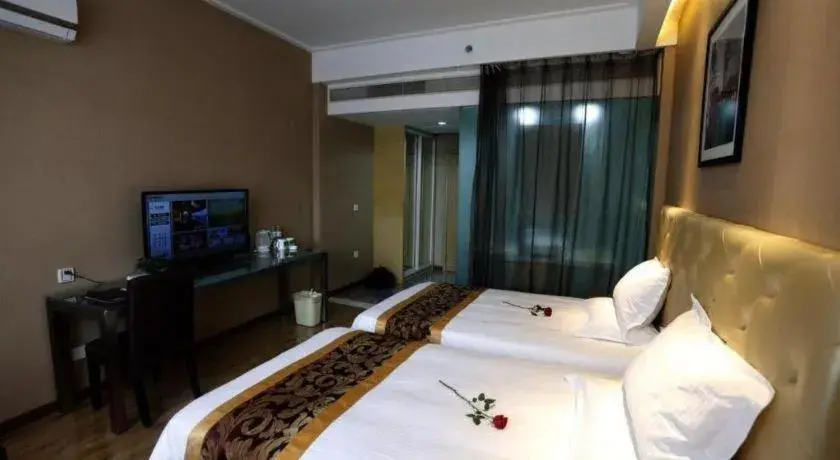 Bed in GreenTree Inn Hangzhou Linan Wanma Road Express Hotel Bed in GreenTree Inn Hangzhou Linan Wanma Road Express Hotel