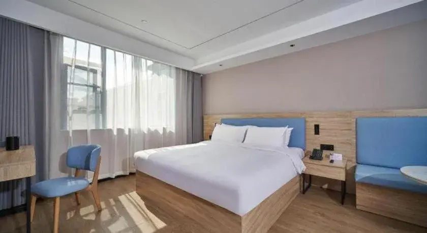 Bed in GreenTree Inn Hangzhou Linan Wanma Road Express Hotel Bed in GreenTree Inn Hangzhou Linan Wanma Road Express Hotel