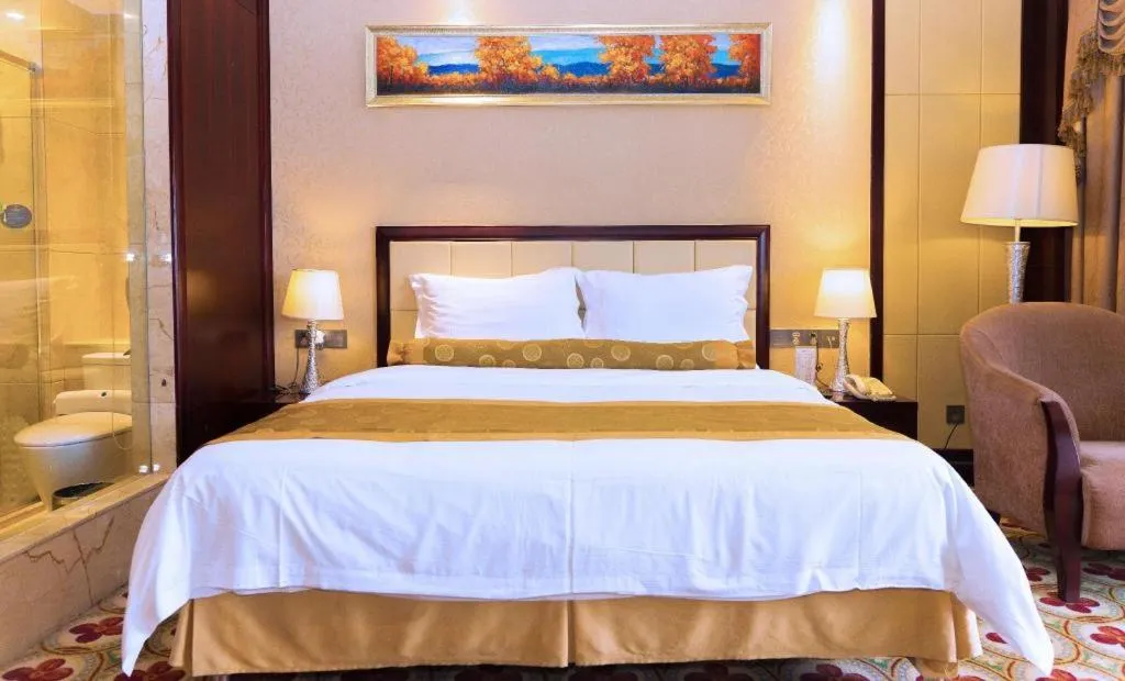 Bed in Taishan Bojue Hotel