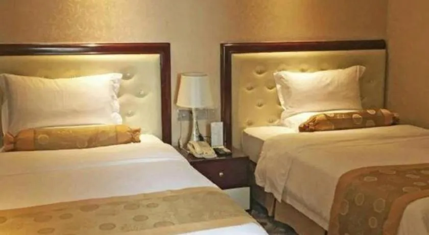 Bed in Taishan Bojue Hotel