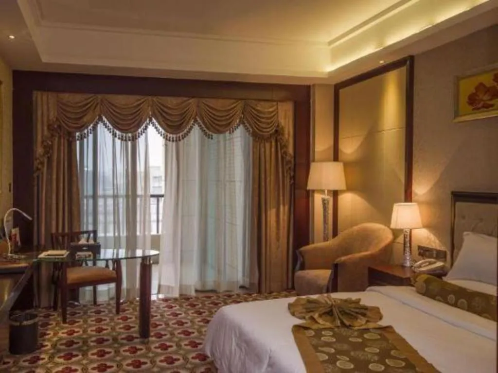 Bed in Taishan Bojue Hotel