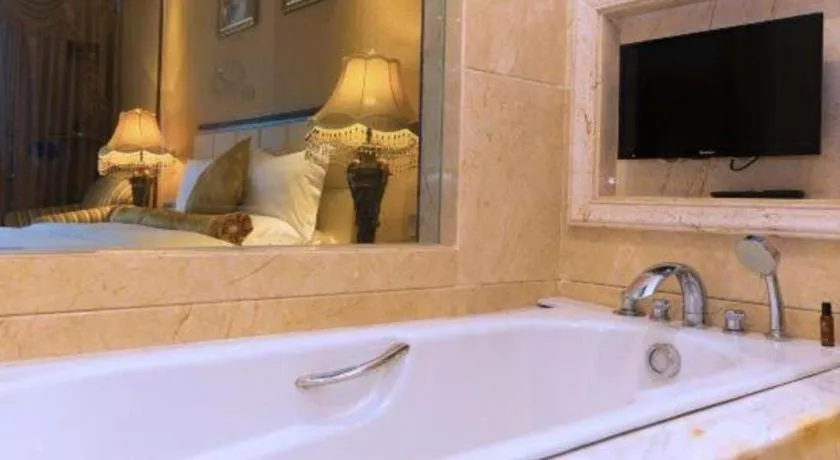 Bed in Taishan Bojue Hotel