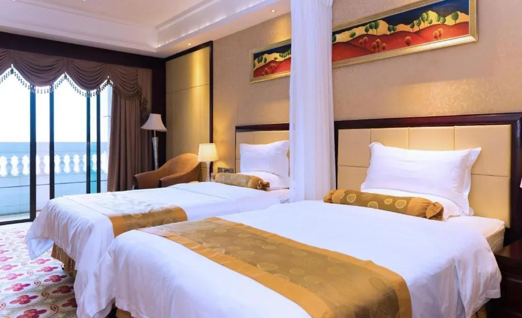 Bed in Taishan Bojue Hotel