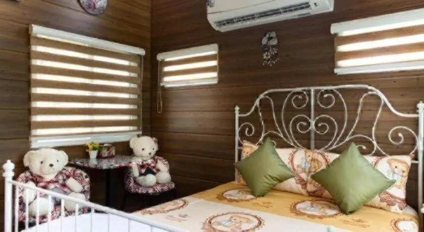 Bed in Greenview Resort