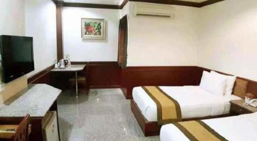 Bed in Nartsiri Hotel