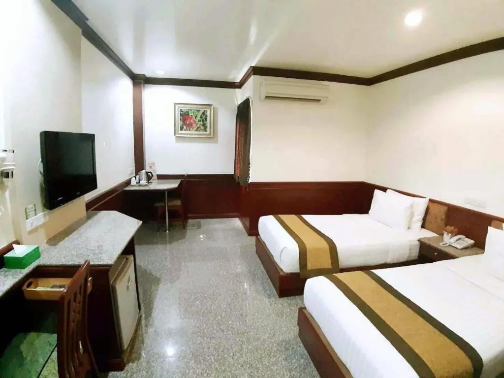 Bed in Nartsiri Hotel