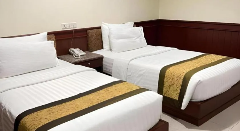 Bed in Nartsiri Hotel