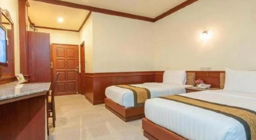 Bed in Nartsiri Hotel