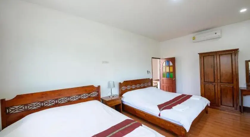 Bed in Baan Suan Aou Khai Bed in Baan Suan Aou Khai