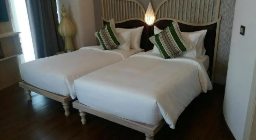 Bed in Baisirimaya Hotel