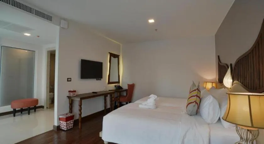 Bed in Baisirimaya Hotel