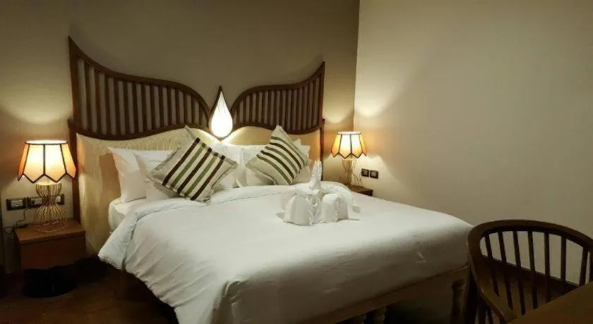 Bed in Baisirimaya Hotel