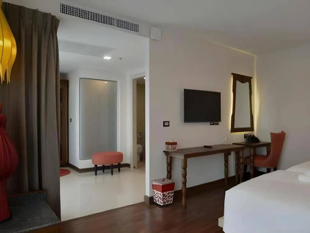 Bed in Baisirimaya Hotel