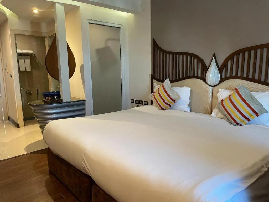 Bed in Baisirimaya Hotel