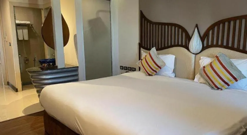 Bed in Baisirimaya Hotel