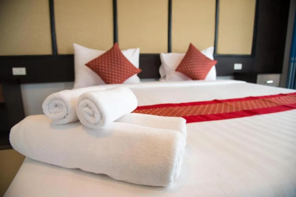 Bed in Poochommhok Resort