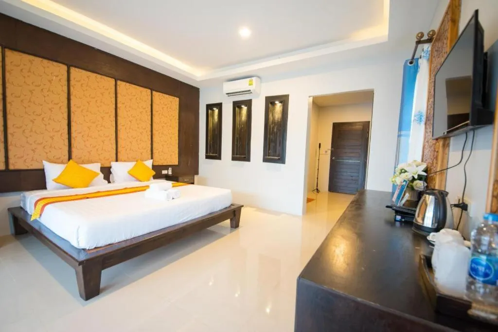 Bed in Poochommhok Resort