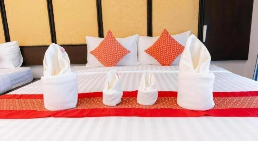 Bed in Poochommhok Resort