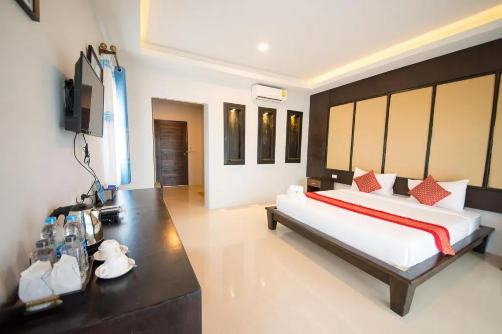 Bed in Poochommhok Resort