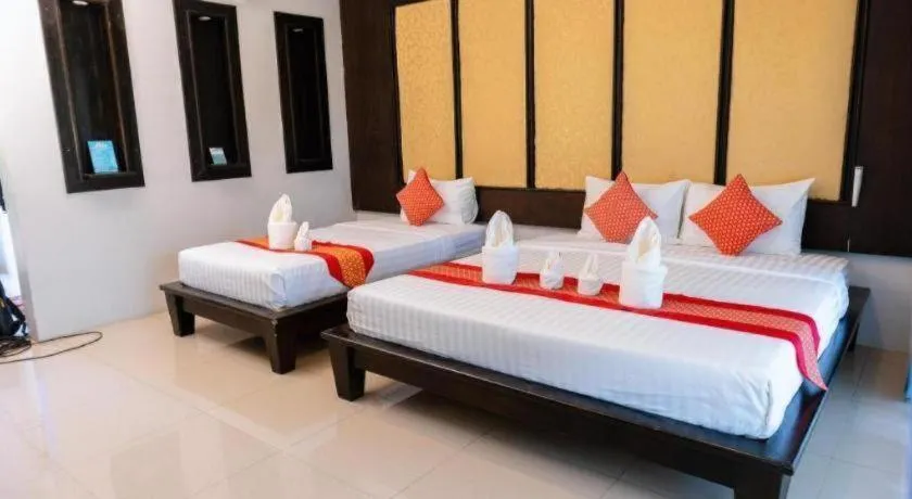 Bed in Poochommhok Resort