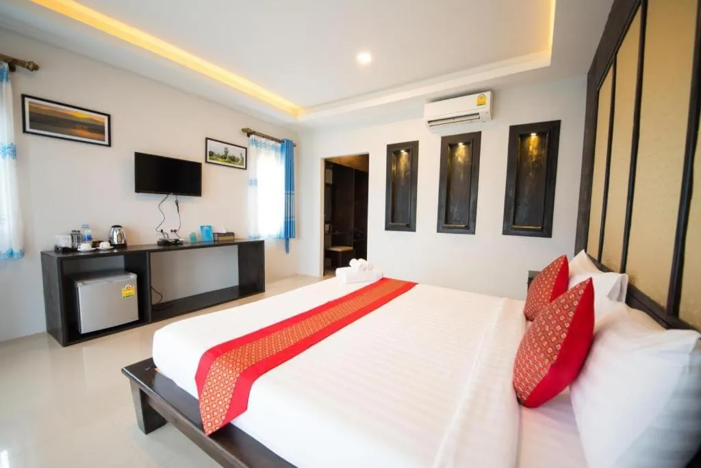 Bed in Poochommhok Resort